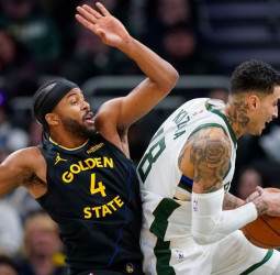 Curry marca la diferencia ante los Bucks, 125-111