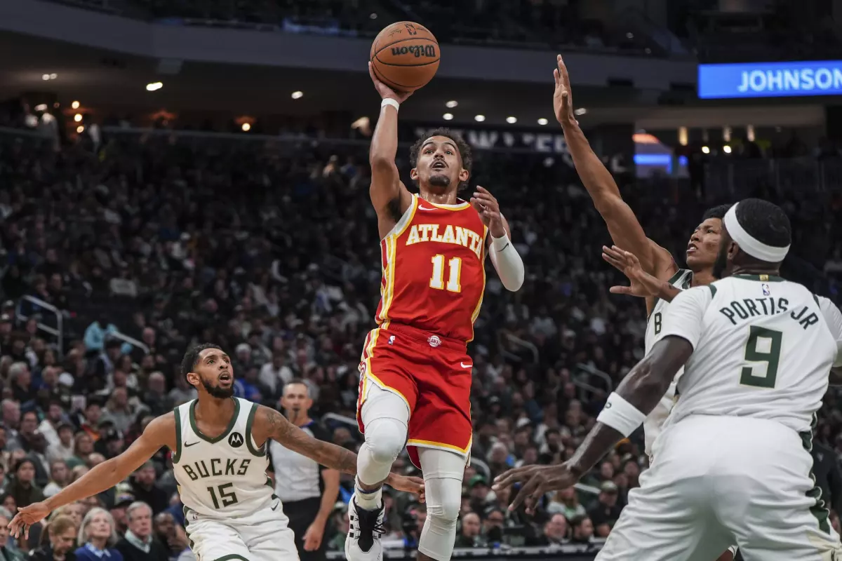 El juego coral de los Hawks supera a los Bucks, 127-110